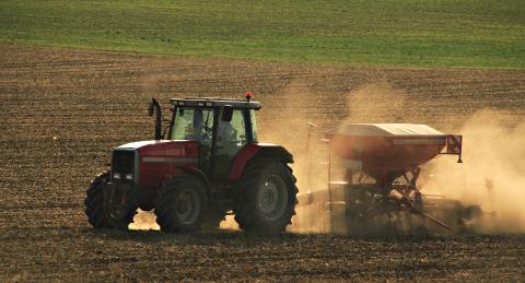 Tractor applying fertiliser